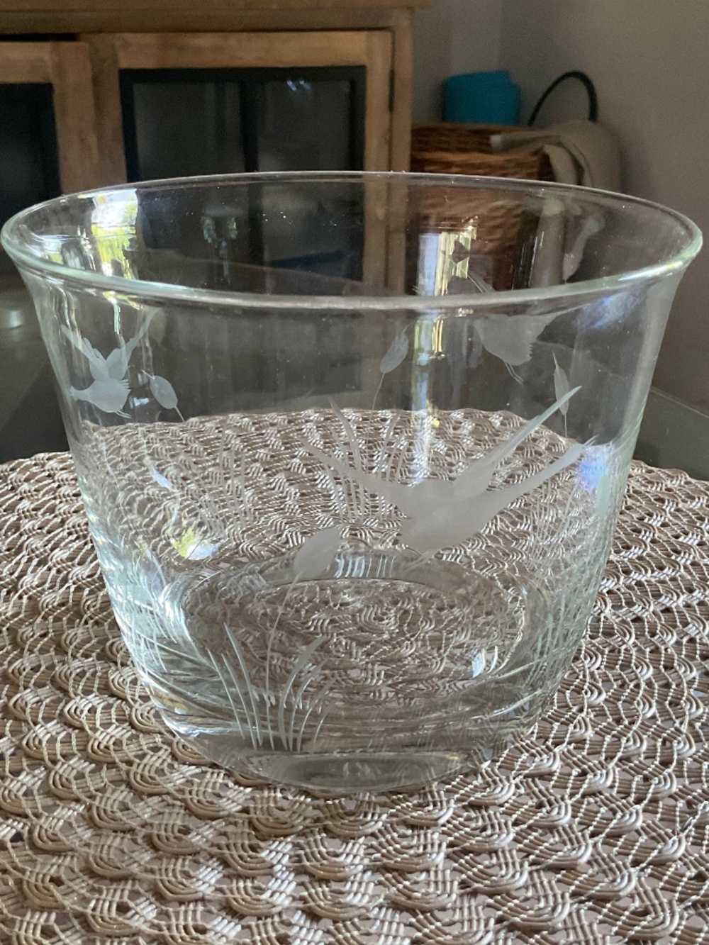 Glass bowl with etched ducks.